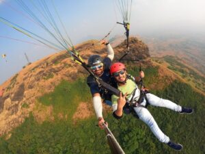 Title: Soaring on Cloud Nine: Paragliding in Kamshet near Lonavala, Mumbai, and Pune! Title: Soaring on Cloud Nine: Paragliding in Kamshet near Lonavala, Mumbai, and Pune!